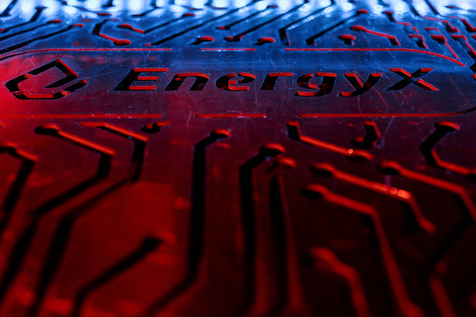 Alloy plate with circuitry design and EnergyX logo laser etched